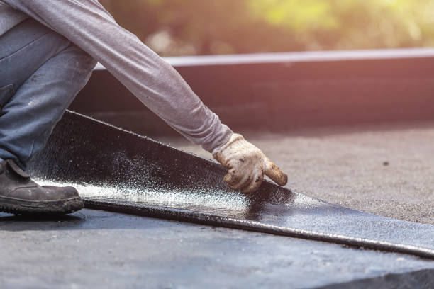 Professional Basement Waterproofing technician working in Rock Island, IL